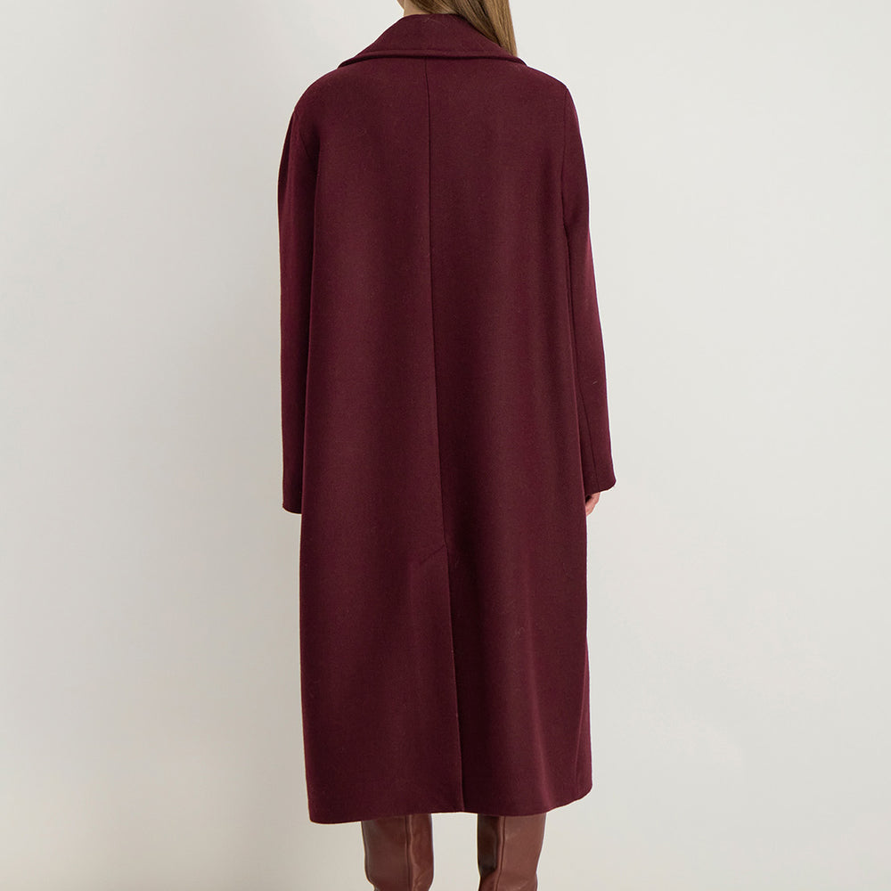 Dos du manteau Natalia coupe droite, finition soignée et longueur mi-longue