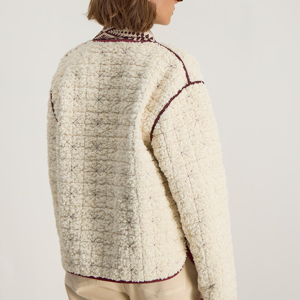 Dos de la veste Marija réversible, col amovible et design contrasté de textures